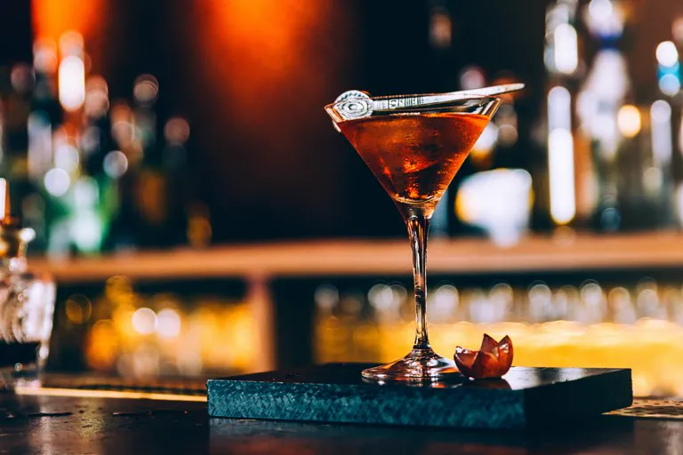 Cocktail in a martini glass on the bar at The Cheetah
