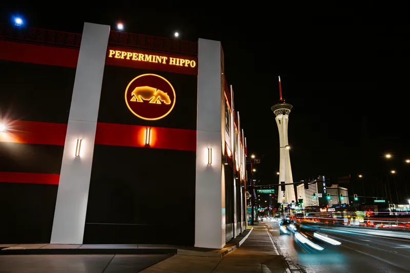 Peppermint Hippo Las Vegas exterior on Las Vegas Boulevard with the Strat tower behind
